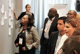 GKI Chief Operating Officer Sara Farley facilitates as The Rockefeller Foundation’s Betty Kibaara and Hunter Goldman join other stakeholders to consider the main post harvest loss challenges beckoning for innovation during the YieldWise kickoff convening held in Nairobi, Kenya in April 2016. (Photo Credit: GKI)