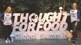 GKI Chief Operating Officer Sara Farley (right) and Program Officer Katie Bowman (left) prepare to facilitate the Three Horizons tool at the Thought For Food Global Summit. (Photo Credit: GKI)